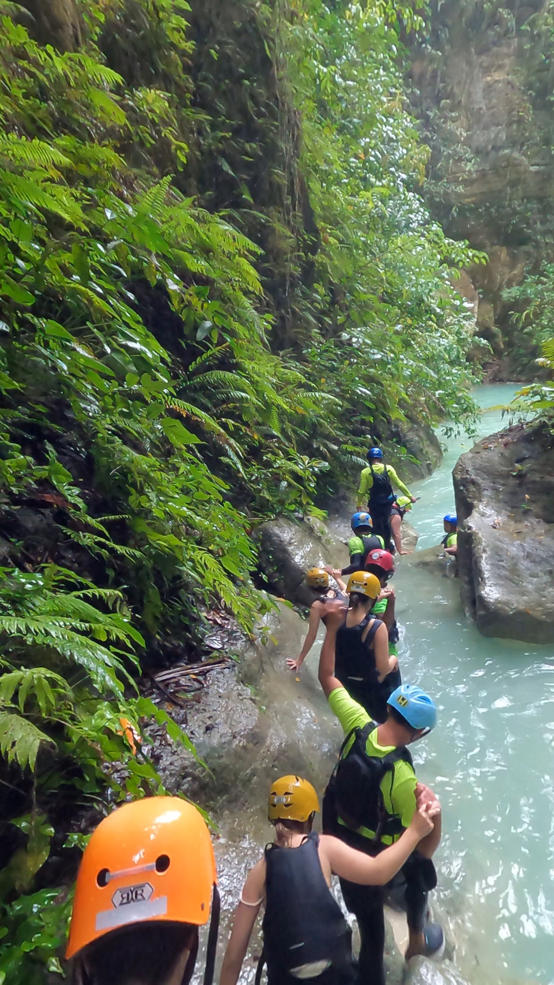 Guest photo — trekking through turquoise Kawasan canyon waters, Cebu