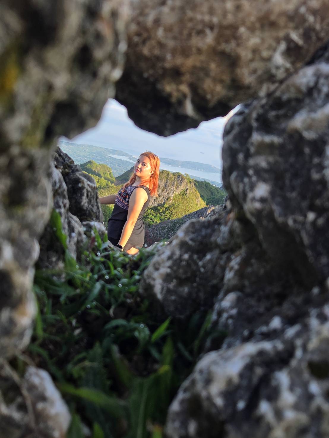Guest photo — sea view through rock window at Osmeña Peak, Cebu